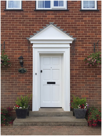 Example of a bespoke timber door from Rural Timber based in Worcester